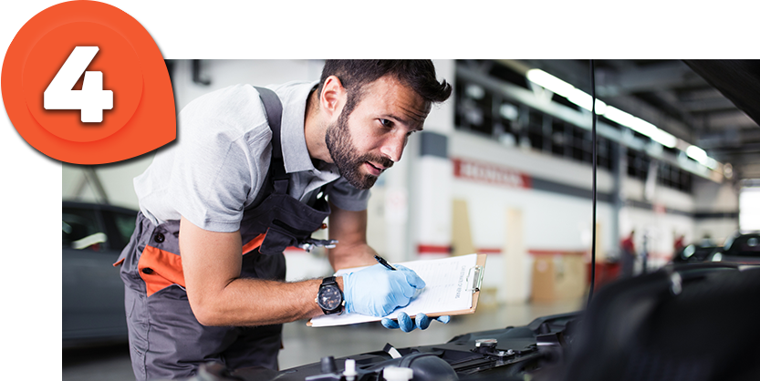 Casa Technician examining a vehicle