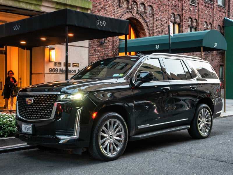 Cadillac Escalade driving through city